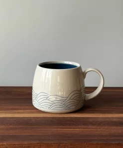 Handmade Pottery Mug with Wave Pattern