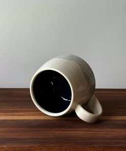 Handmade Pottery Mug with Wave Pattern