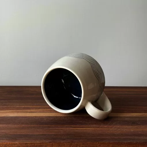 Handmade Pottery Mug with Wave Pattern