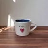 Handmade Pottery Mug with Knit Texture Heart and the word KNIT.