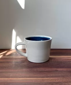 Handmade Pottery Mug with Knit Texture Heart and the word KNIT.